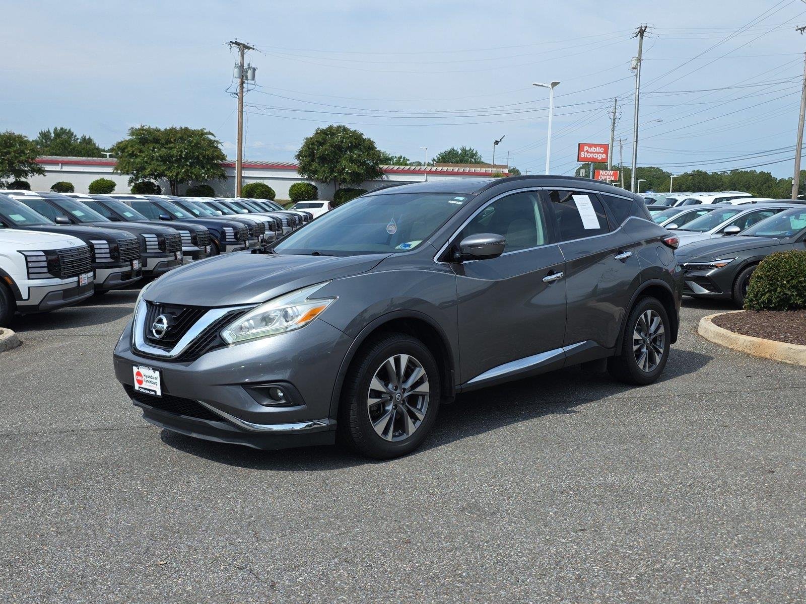 Used 2016 Gun Metallic Nissan SV image 4