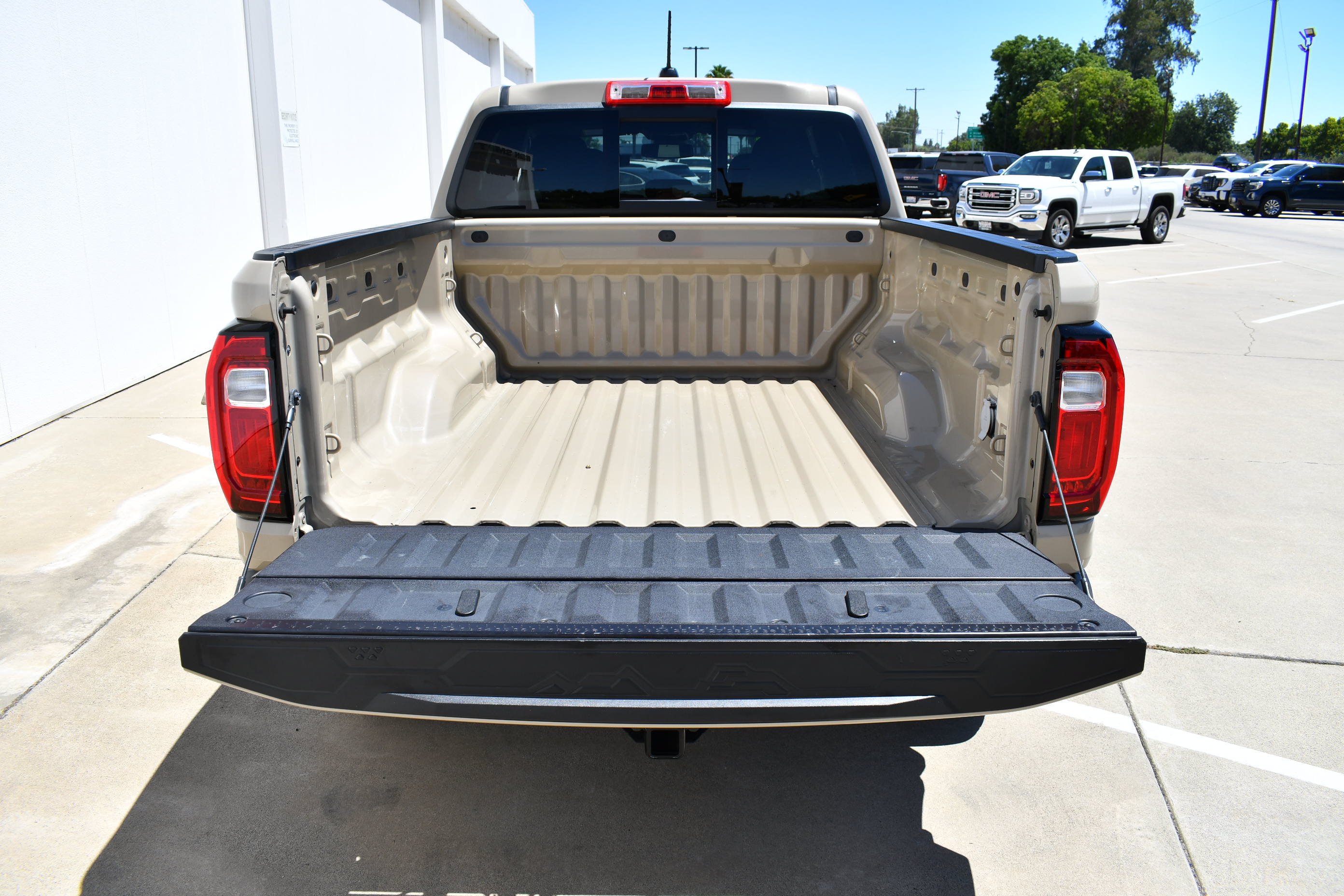 Used 2024 Desert Sand Metallic GMC Elevation image 8