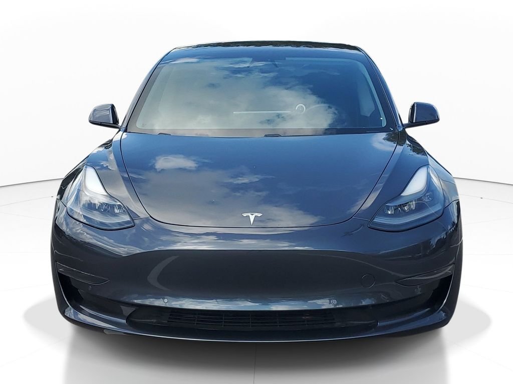 Used 2021 Tesla Model 3 Base with VIN 5YJ3E1EA2MF986144 for sale in Orlando, FL