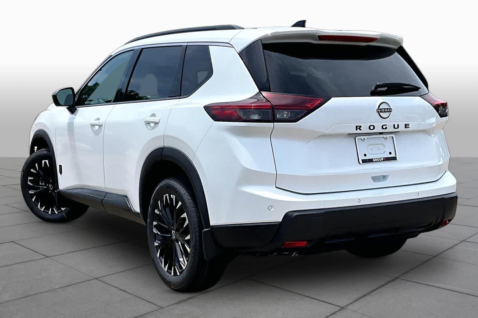 New 2026 Everest White Pearl TriCoat Nissan Dark Armor image 7
