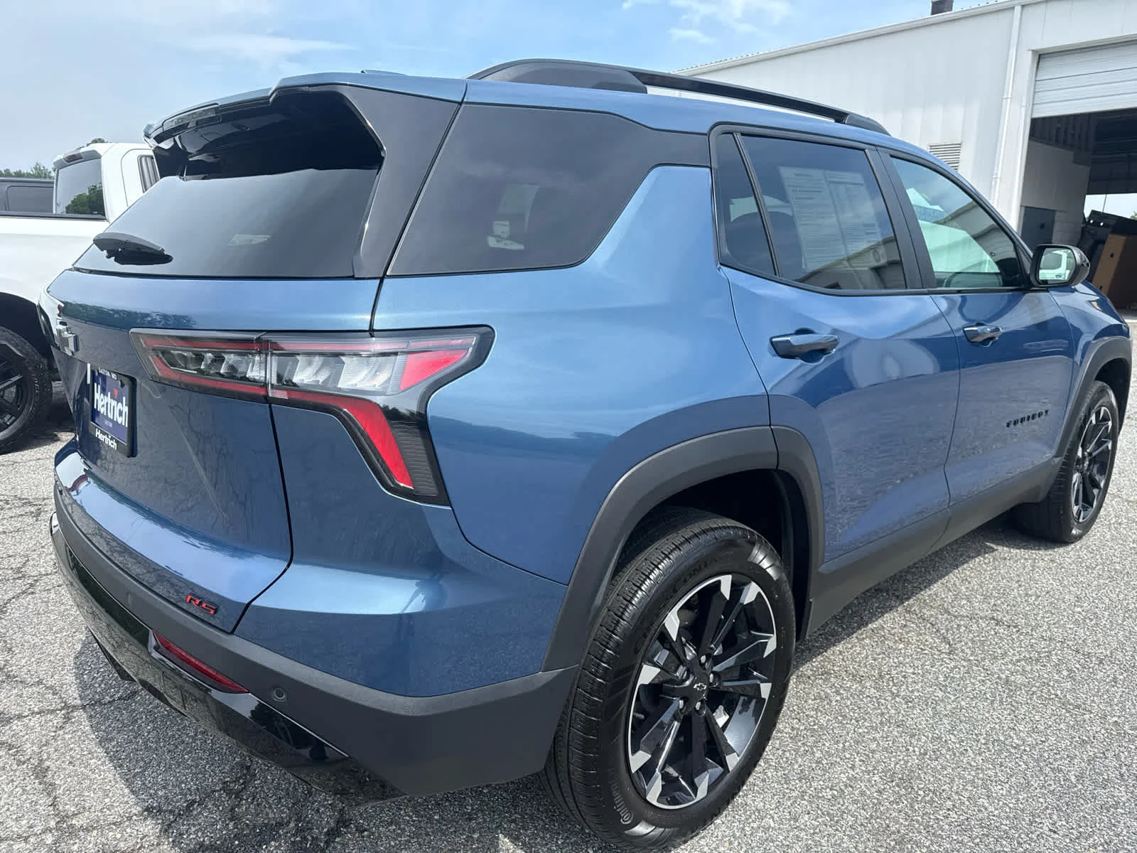 Used 2026 Lakeshore Blue Metallic Chevrolet AWD RS image 6