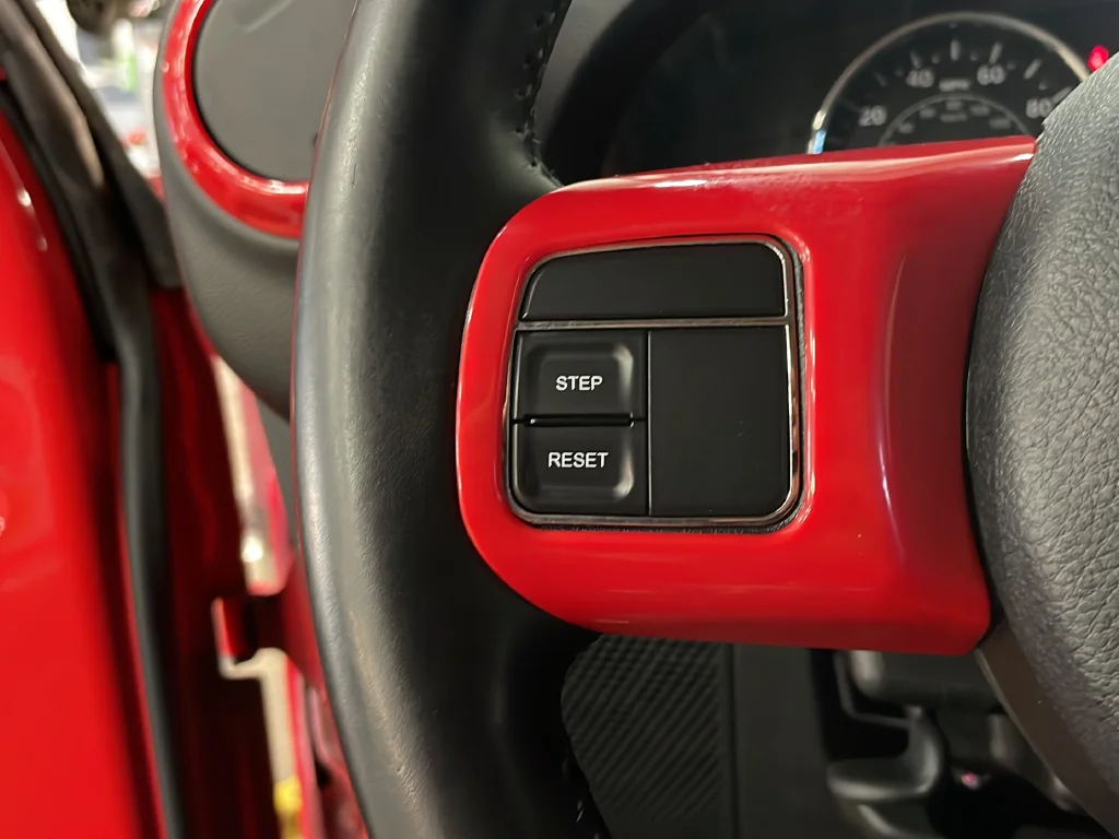 Used 2013 Red Jeep Unlimited Sport image 16
