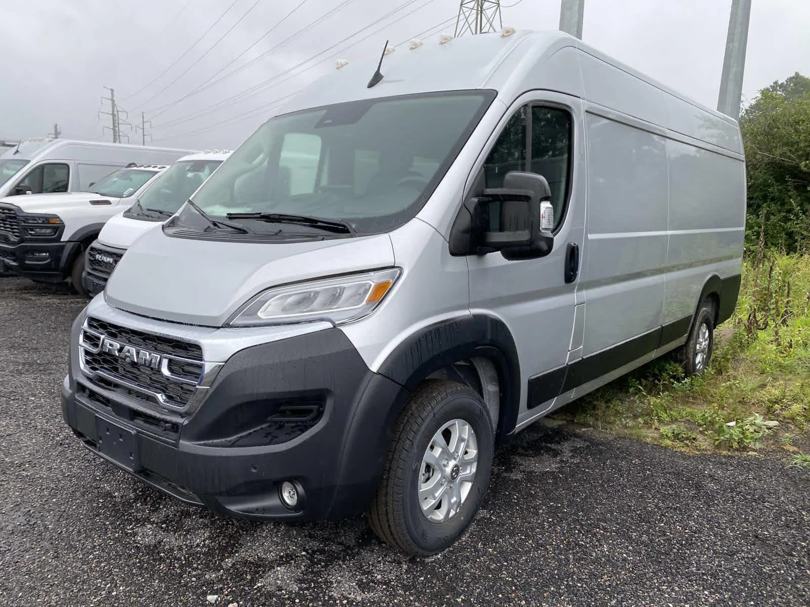 Used 2025 Bright Silver Metallic Clearcoat Ram SLT+ image 3