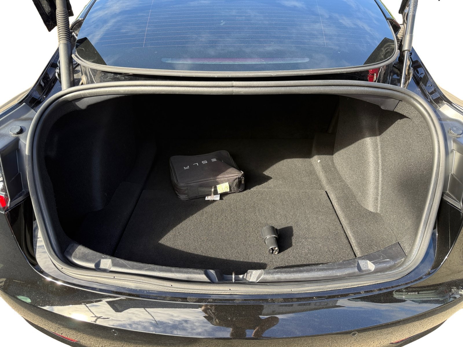 Used 2022 Solid Black Tesla Base image 17