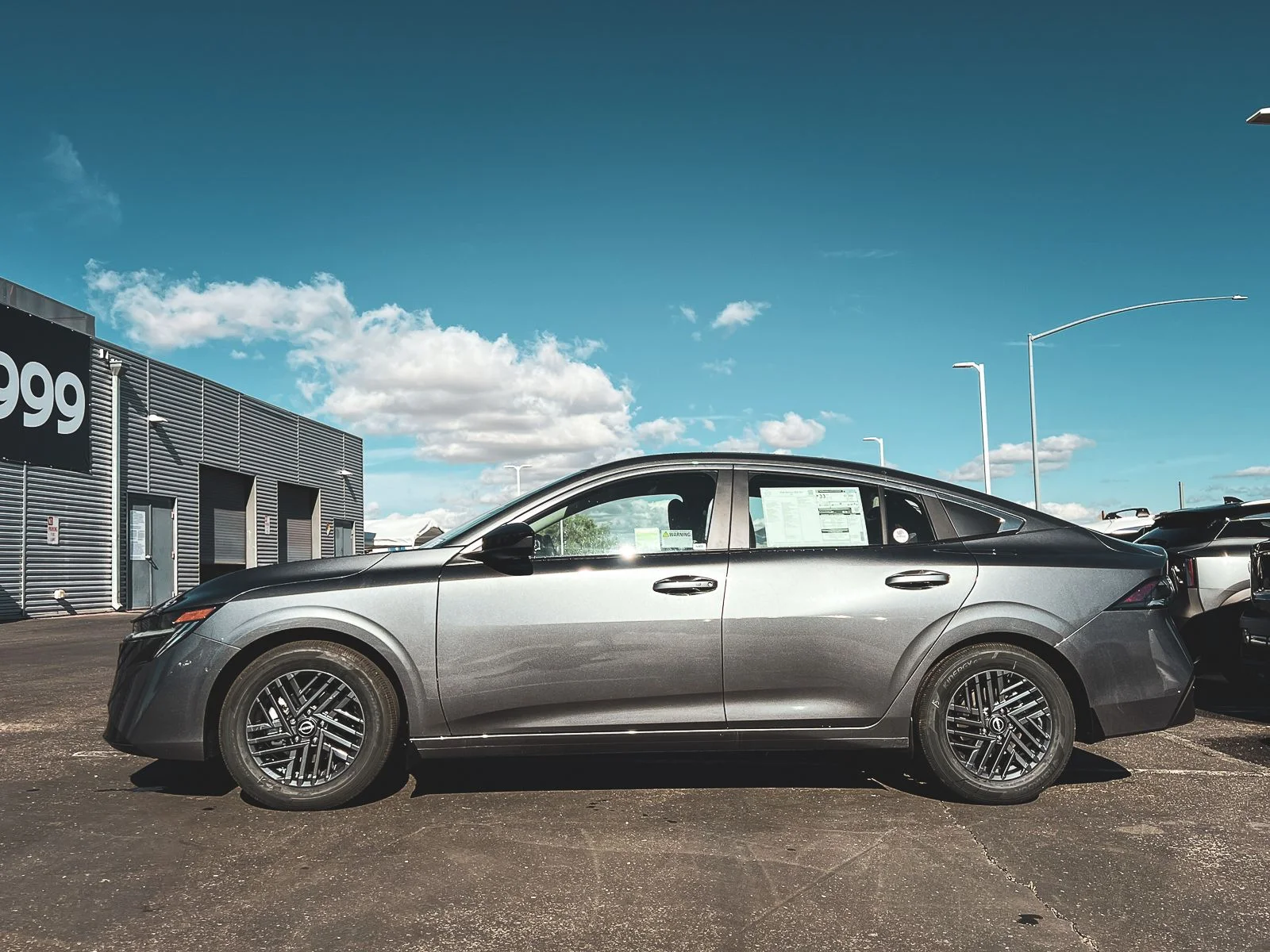 New 2026 Gun Metallic Nissan SV image 6