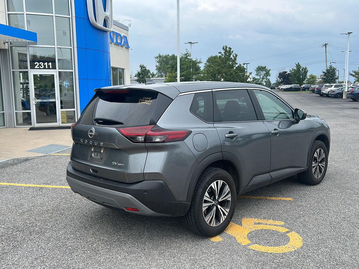 Used 2023 Gun Metallic Nissan SV image 3