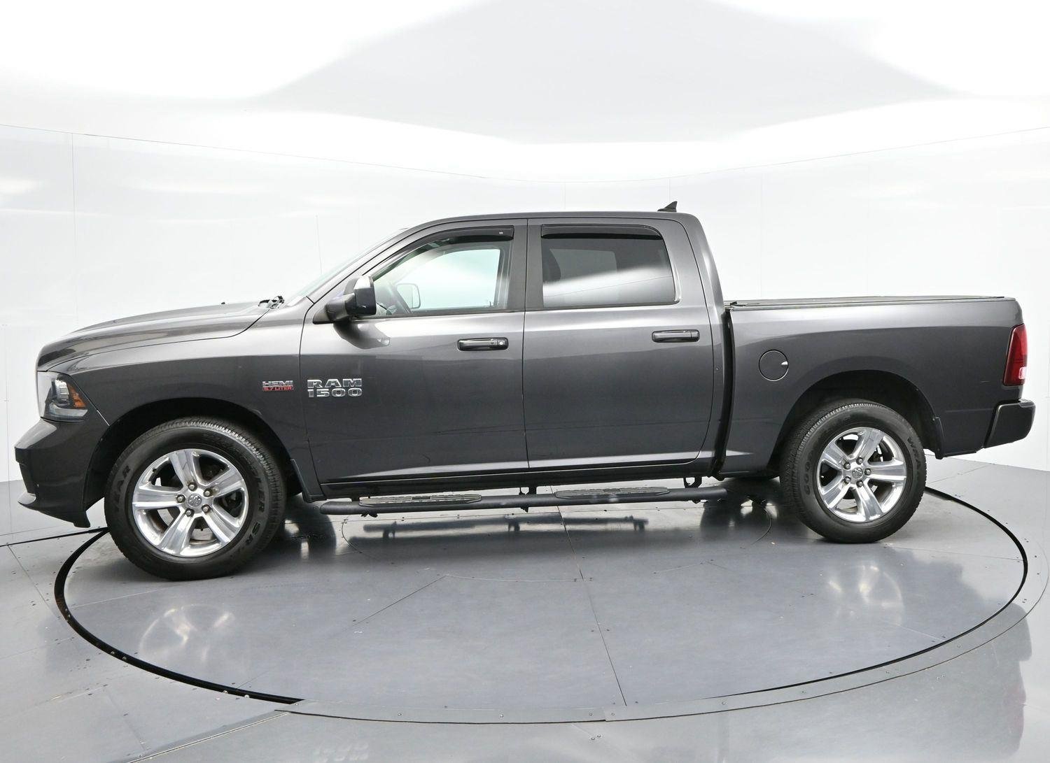 Used 2017 Granite Crystal Metallic Clearcoat Ram Sport image 4