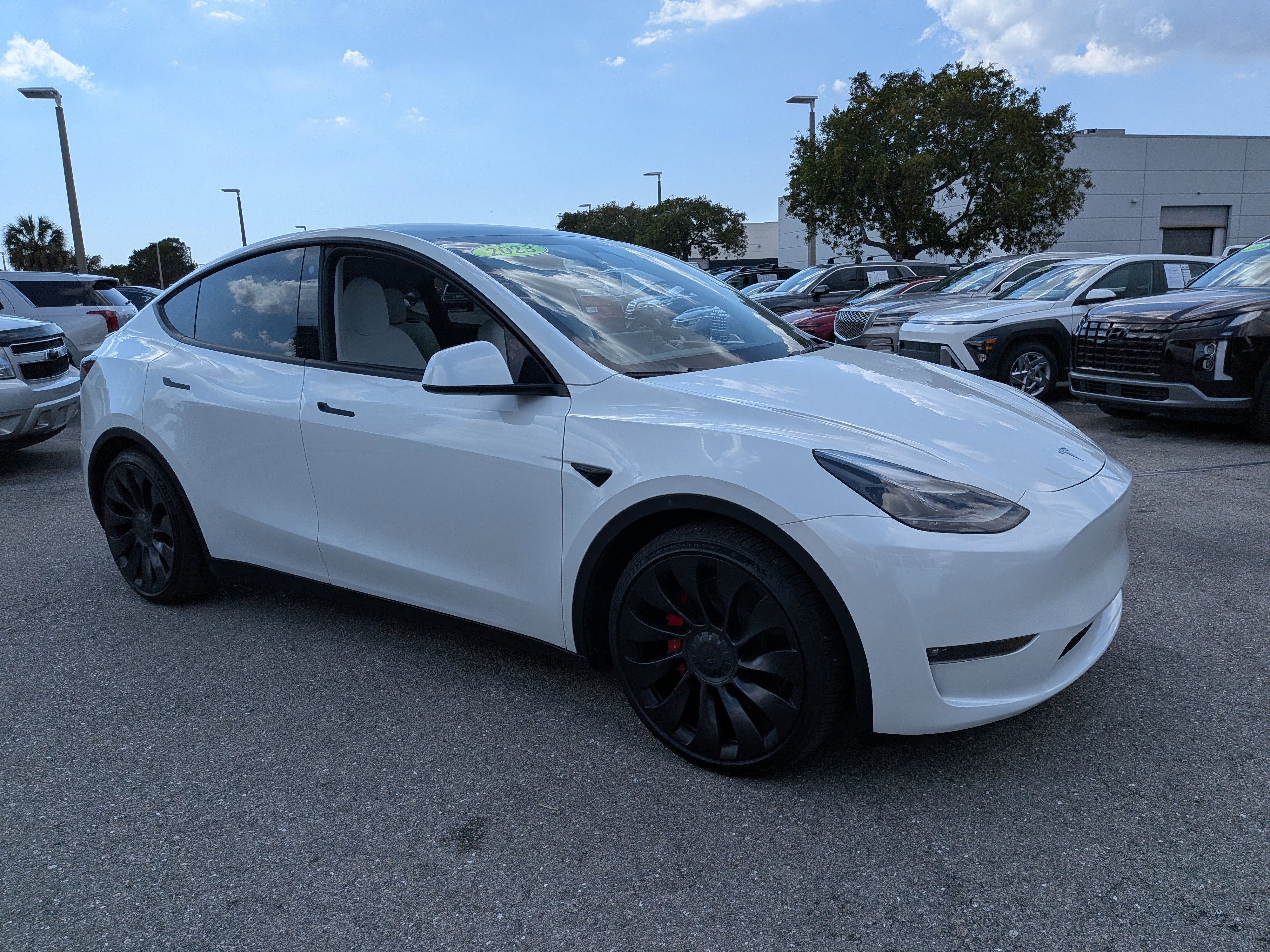 Used 2023 Tesla Model Y Performance with VIN 7SAYGDEF8PF705128 for sale in Fort Myers, FL