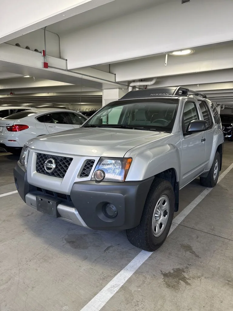 Used 2009 Silver Lightning Metallic Nissan X image 1