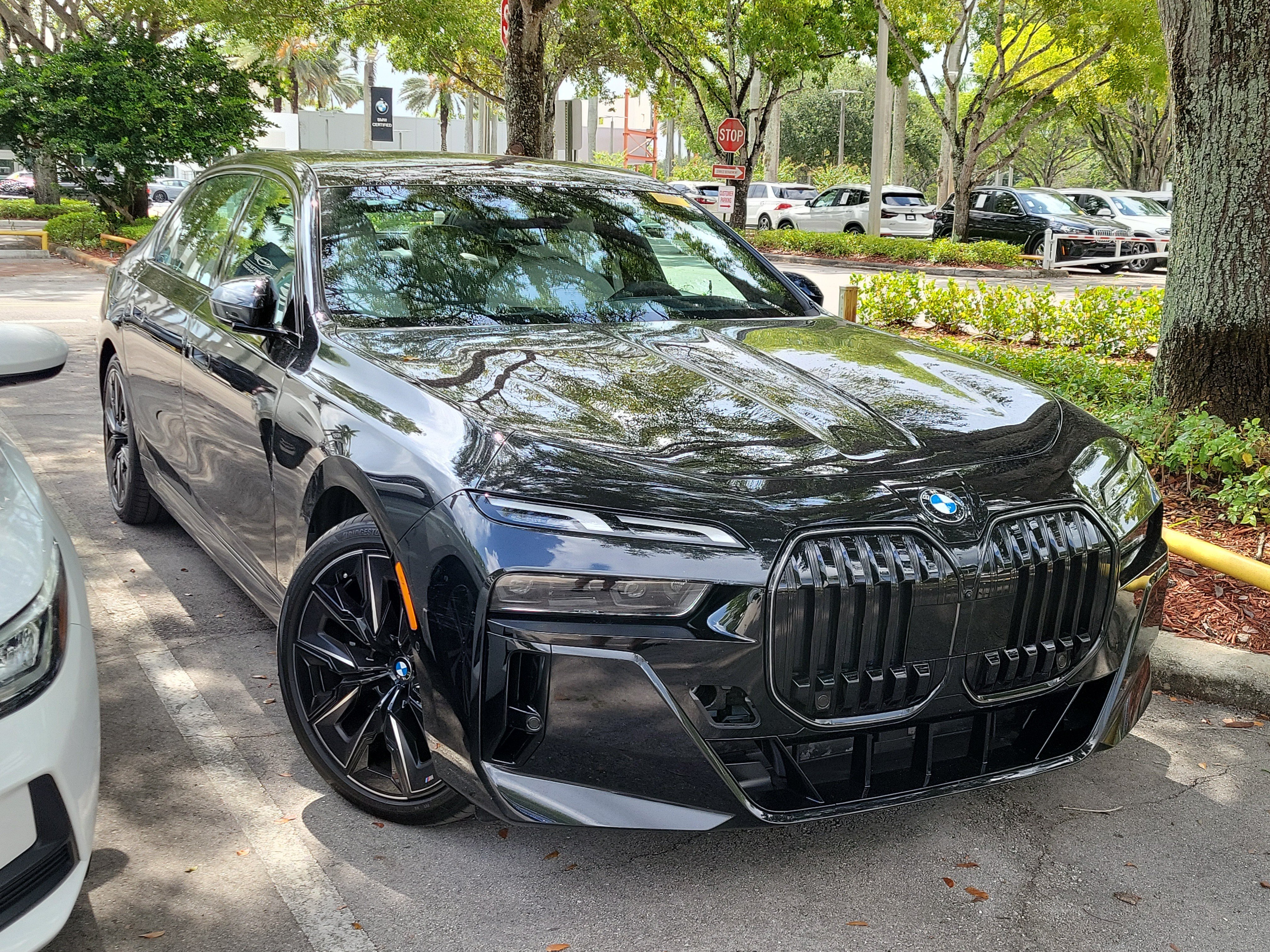 Used 2025 Black Sapphire Metallic BMW 740i image 1