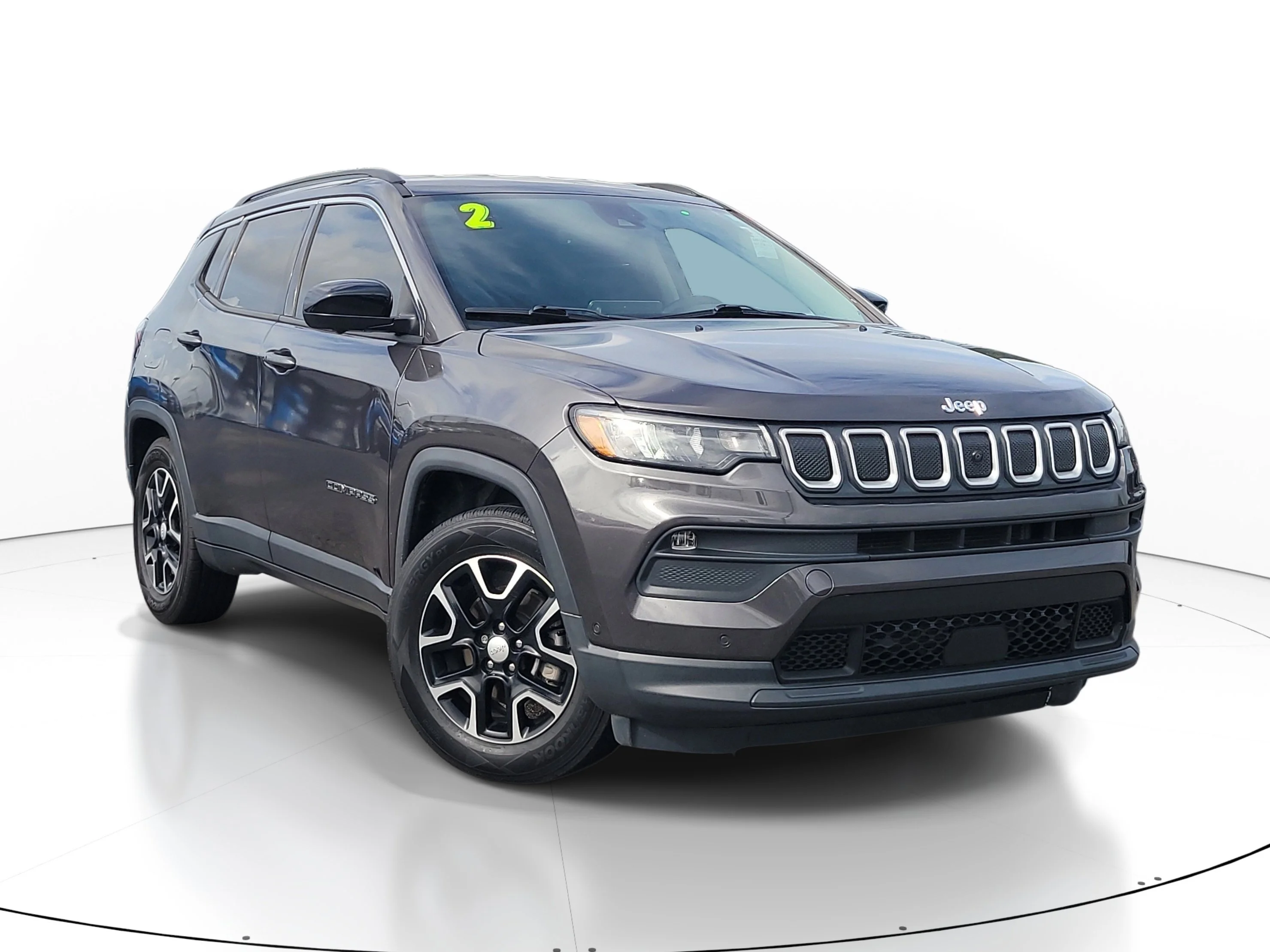 Used 2022 Granite Crystal Metallic Clearcoat Jeep Latitude image 1