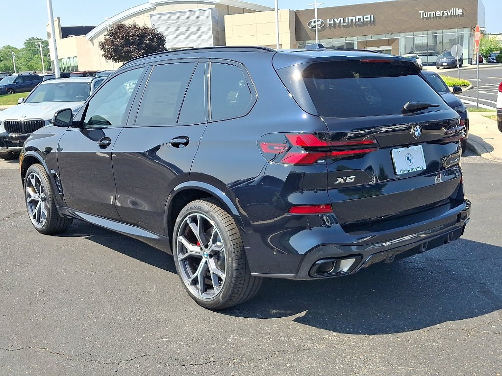 New 2026 Carbon Black Metallic BMW xDrive40i image 3