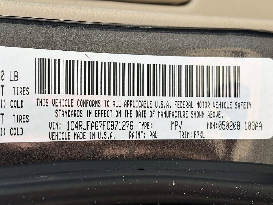 Used 2015 Granite Crystal Metallic Clearcoat Jeep Laredo image 24