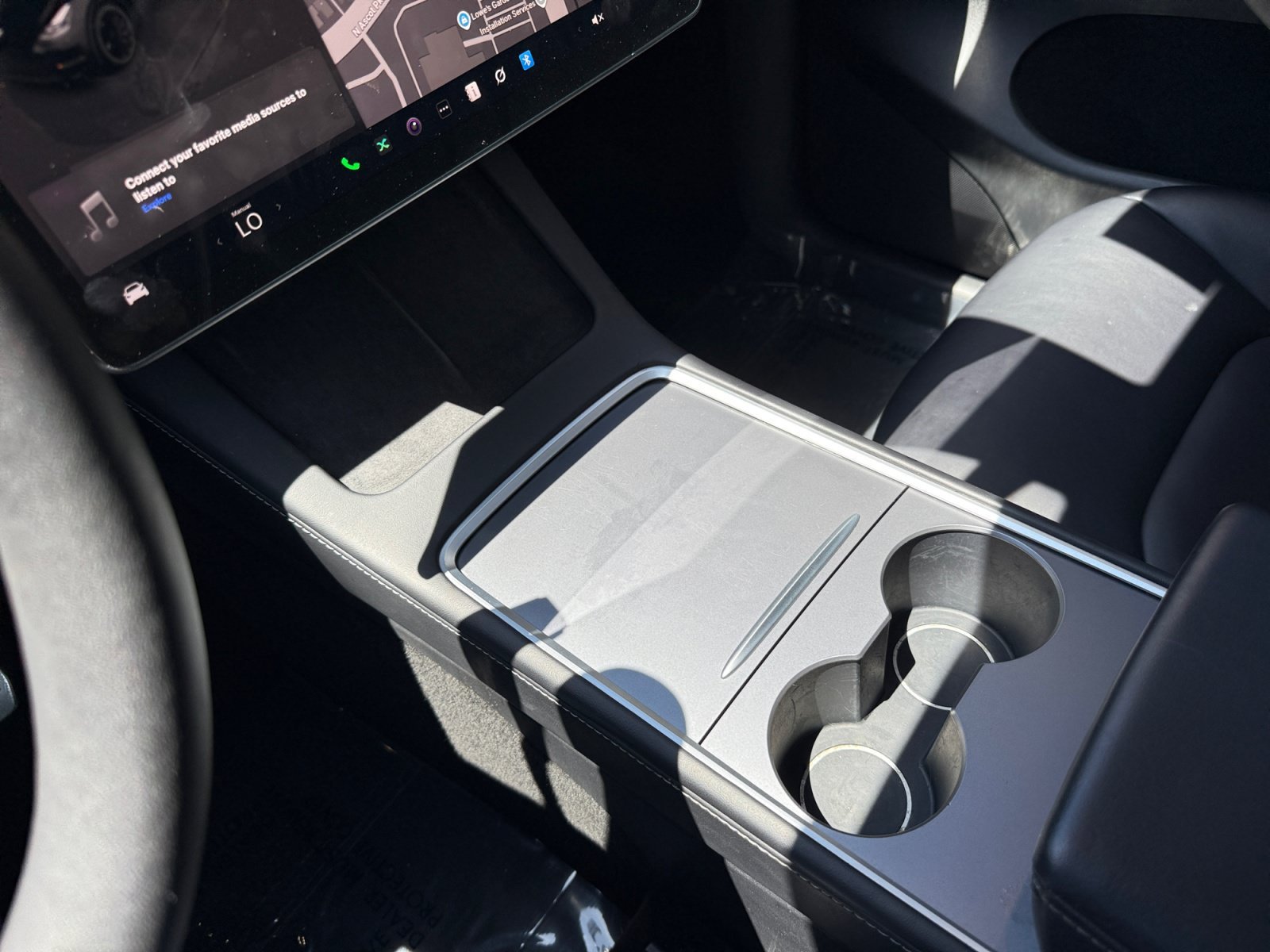Used 2024 Solid Black Tesla Performance image 13