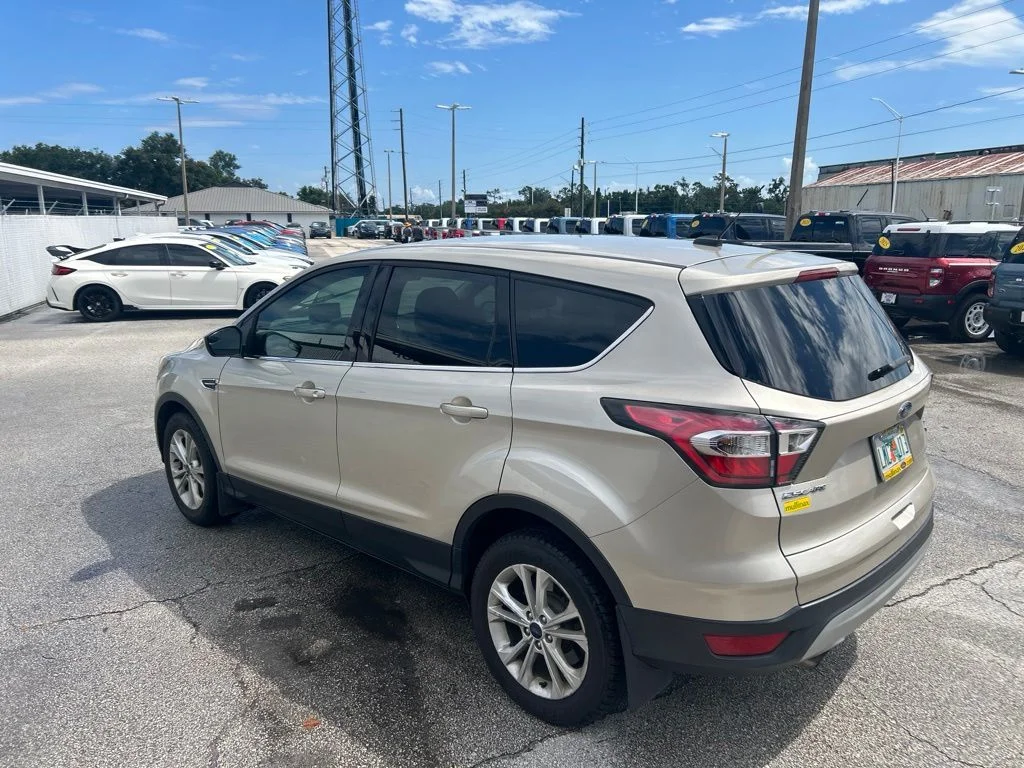 Used 2017 Gold Ford SE image 4