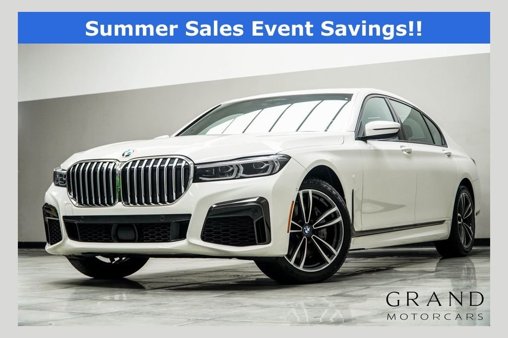 Used 2021 White BMW 740i xDrive image 1