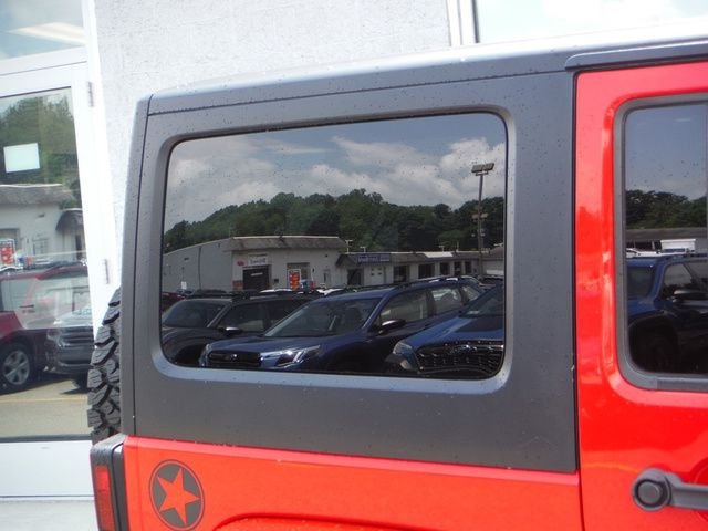 Used 2018 Red Jeep Unlimited Sport image 2