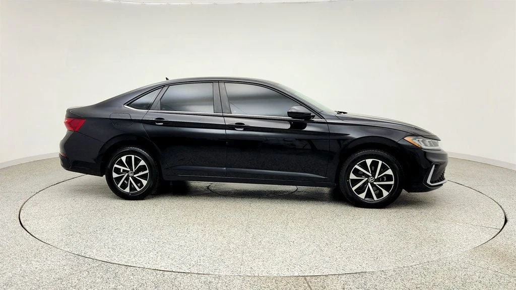 Used 2025 Deep Black Pearl Volkswagen S Automatic w/ Auto-Dimming Mirror image 4