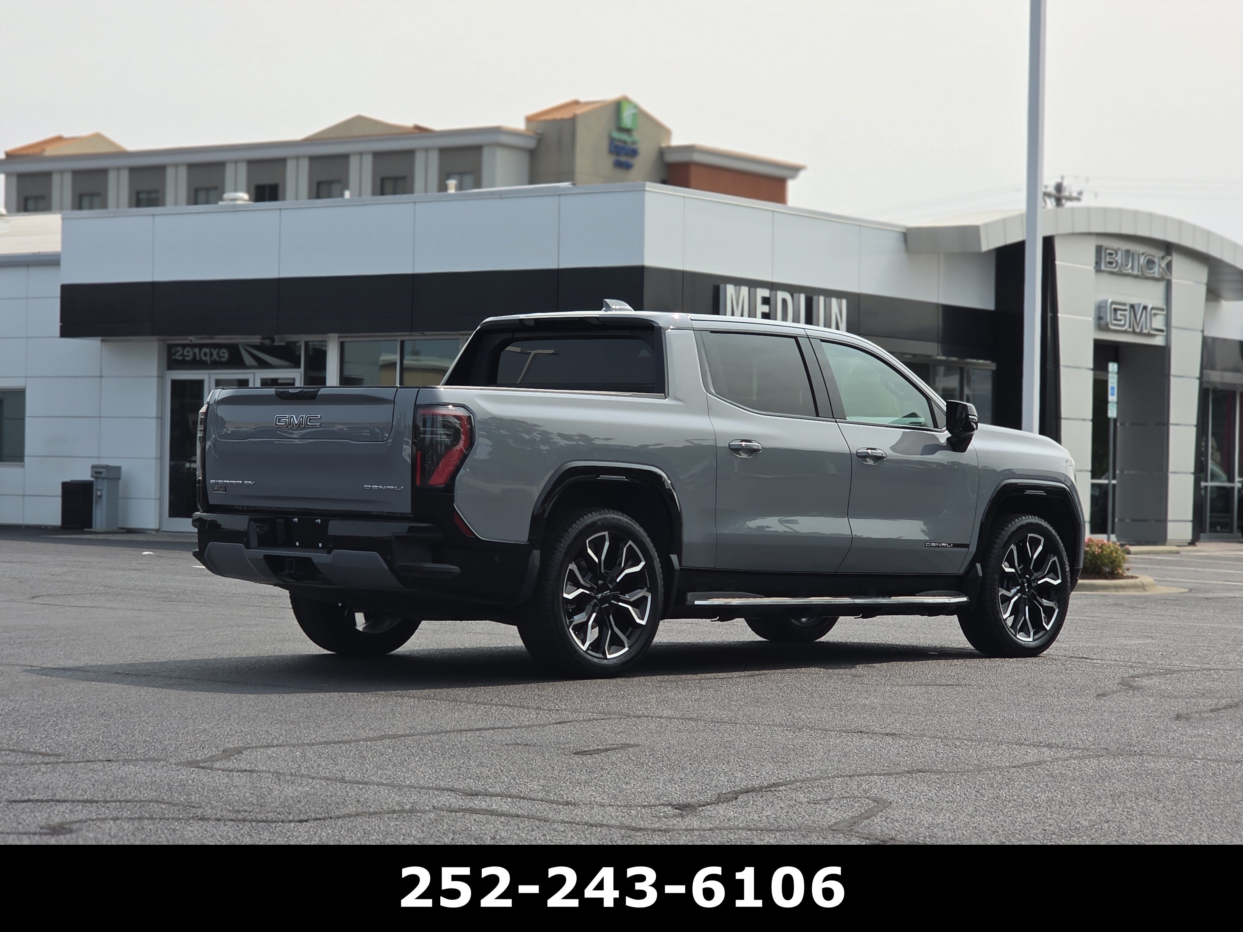Used 2025 Thunderstorm Gray GMC Max Range Denali image 7