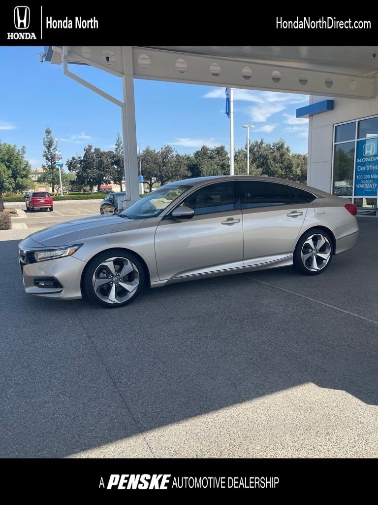 Certified Used 2018 Champagne Frost Pearl Honda Touring image 1