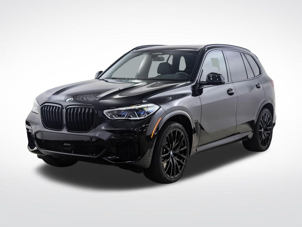 Used 2022 Black Sapphire Metallic BMW M50i image 1