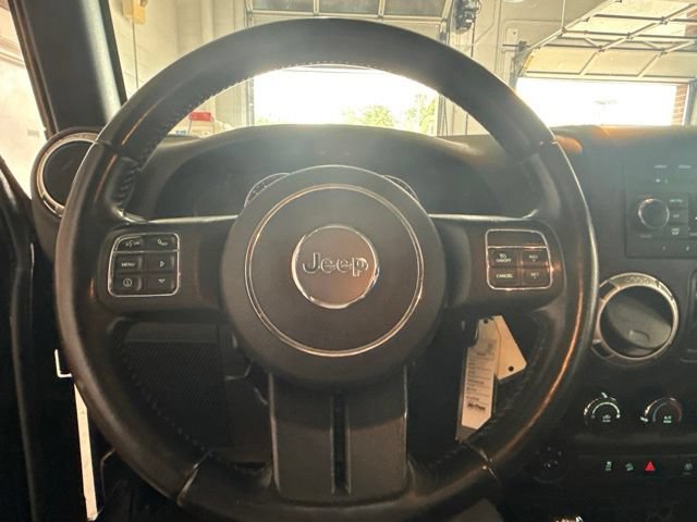 Used 2016 Black Jeep Sahara image 13