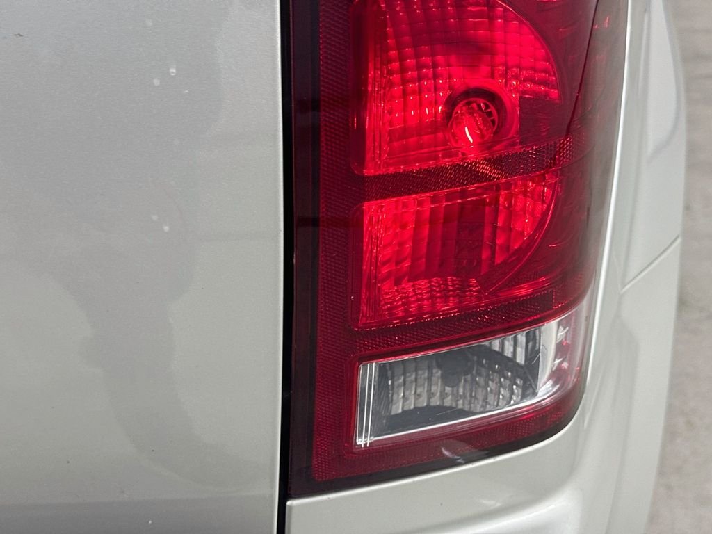 Used 2010 Light Graystone Pearlcoat Jeep Laredo image 32