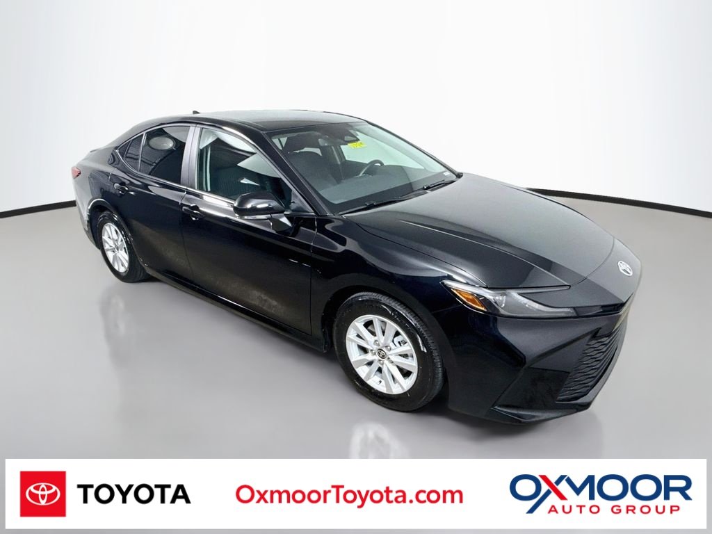 Used 2025 Midnight Black Metallic Toyota LE image 1