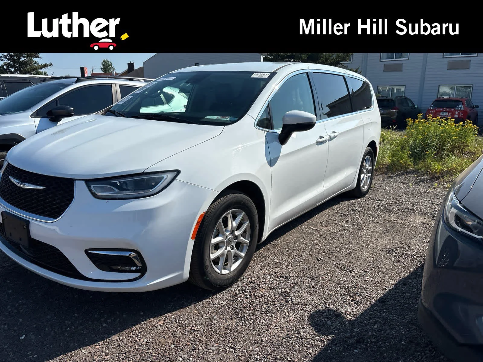 Used 2023 Bright White Clearcoat Chrysler Touring L image 1