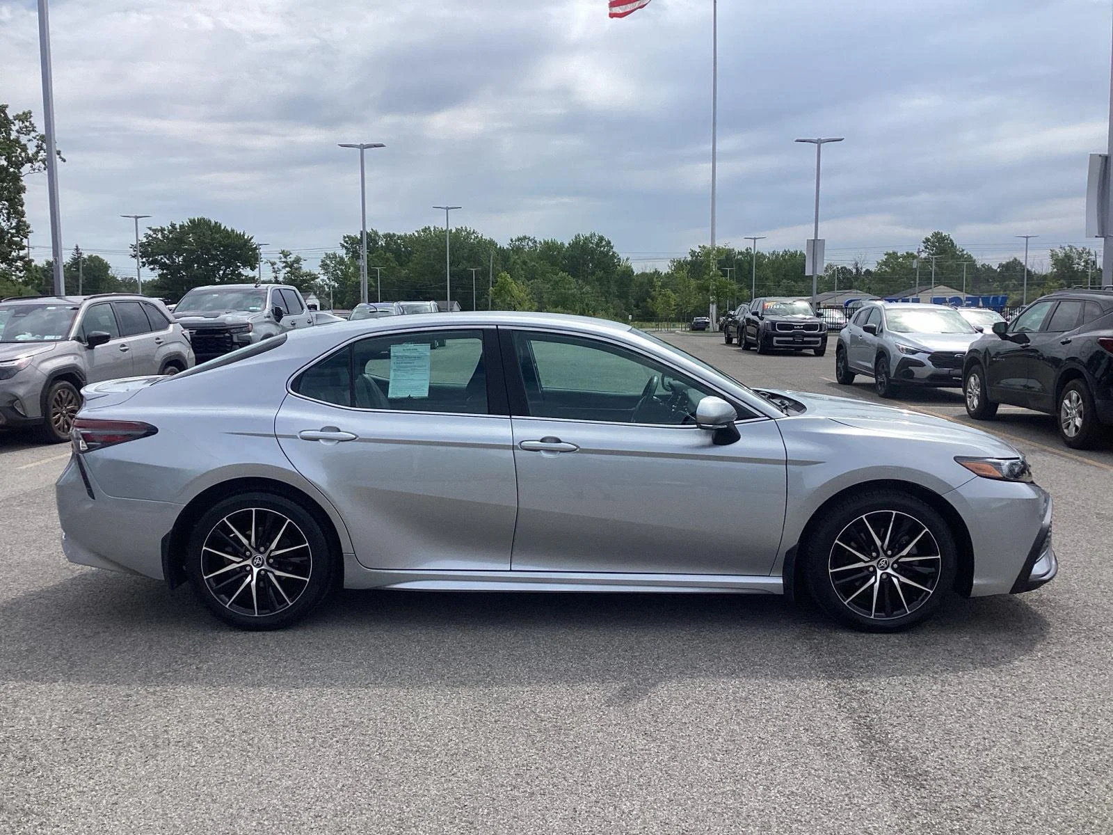 Used 2023 Celestial Silver Metallic Toyota SE image 9