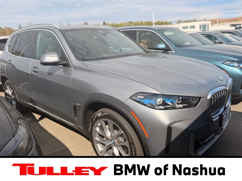 New 2026 Skyscraper Grey Metallic BMW xDrive40i image 1
