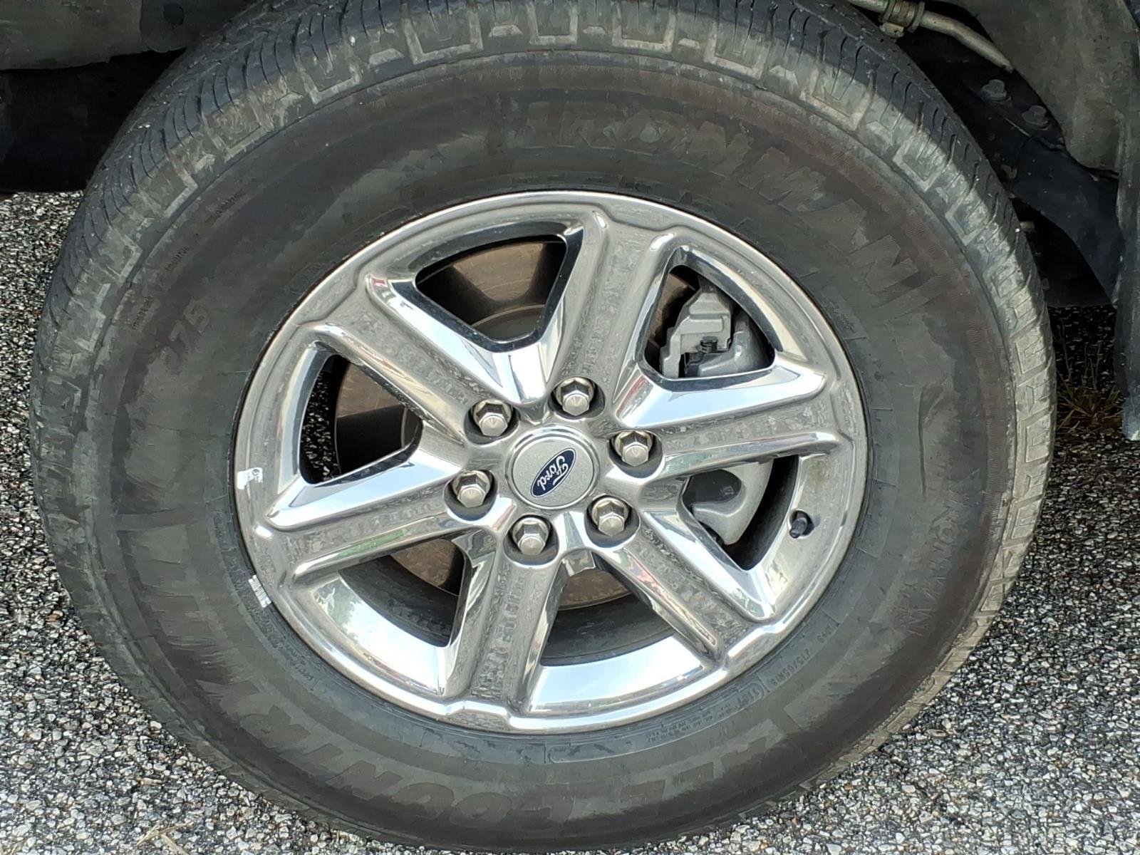 Used 2024 Agate Black Metallic Ford XLT image 4