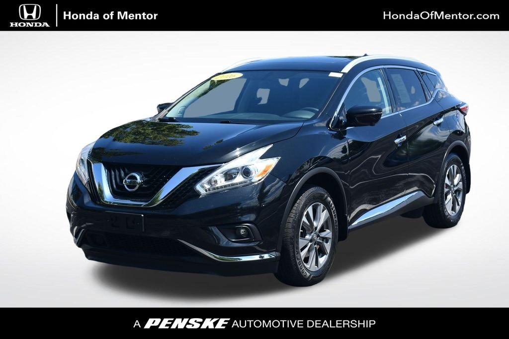 Used 2016 Magnetic Black Nissan SL image 1