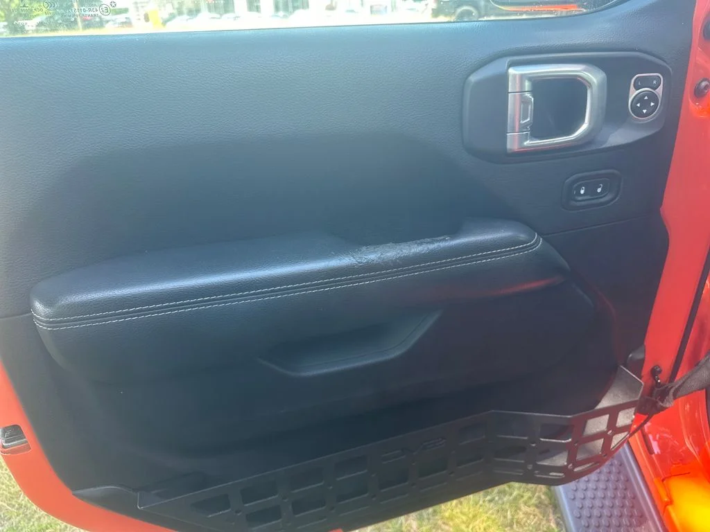 Used 2018 Orange Jeep Unlimited Sahara image 11