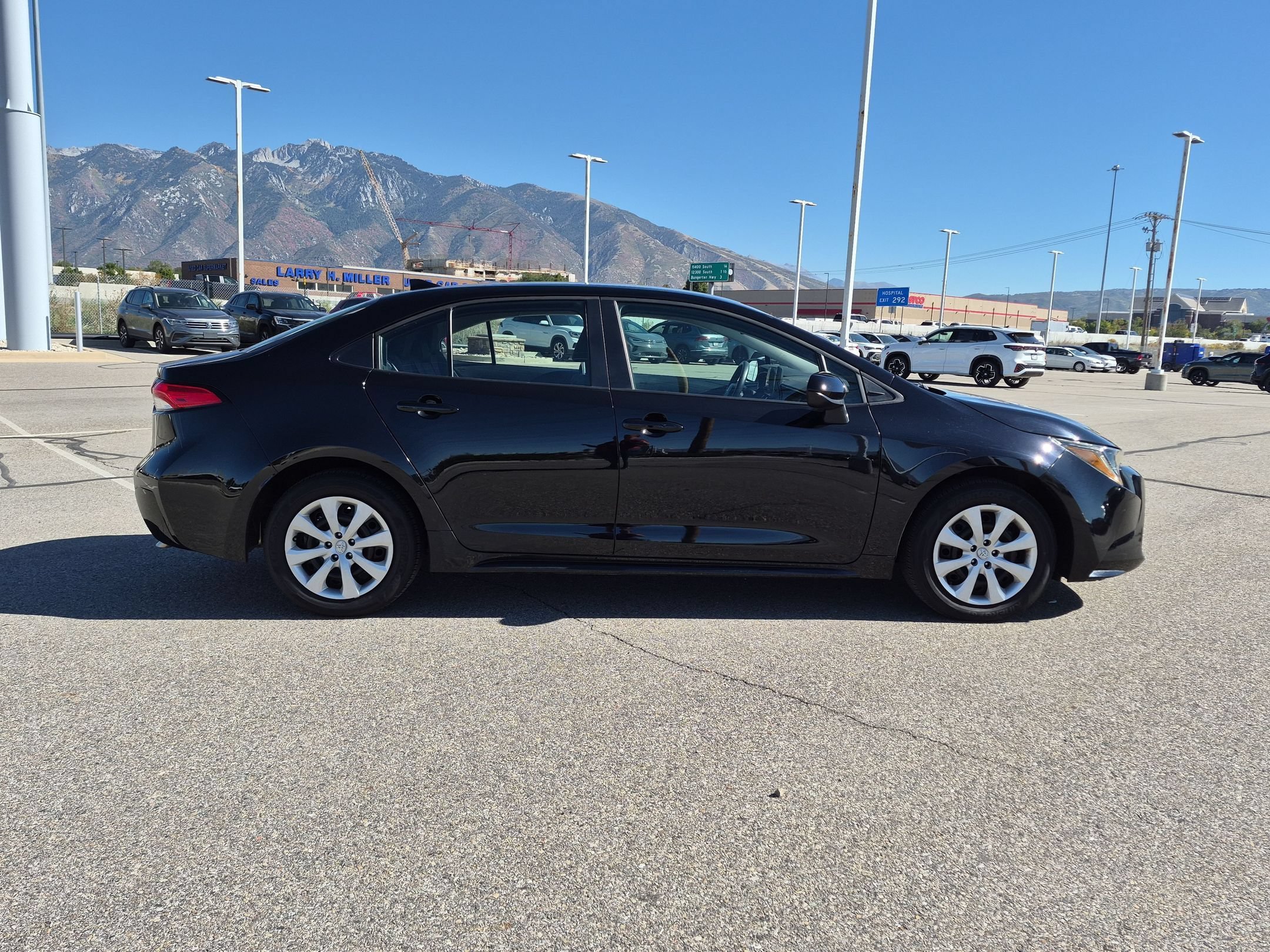 Used 2026 Midnight Black Metallic Toyota LE image 2