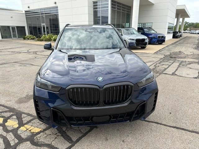 Used 2025 Blue BMW xDrive50e image 4