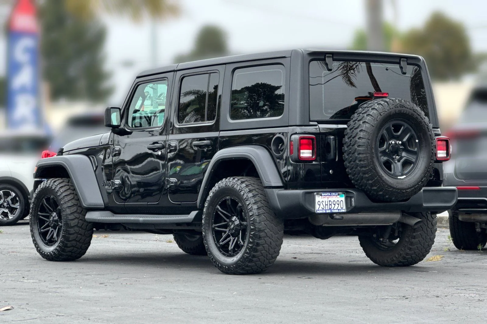 Used 2024 Black Clearcoat Jeep Sport image 29