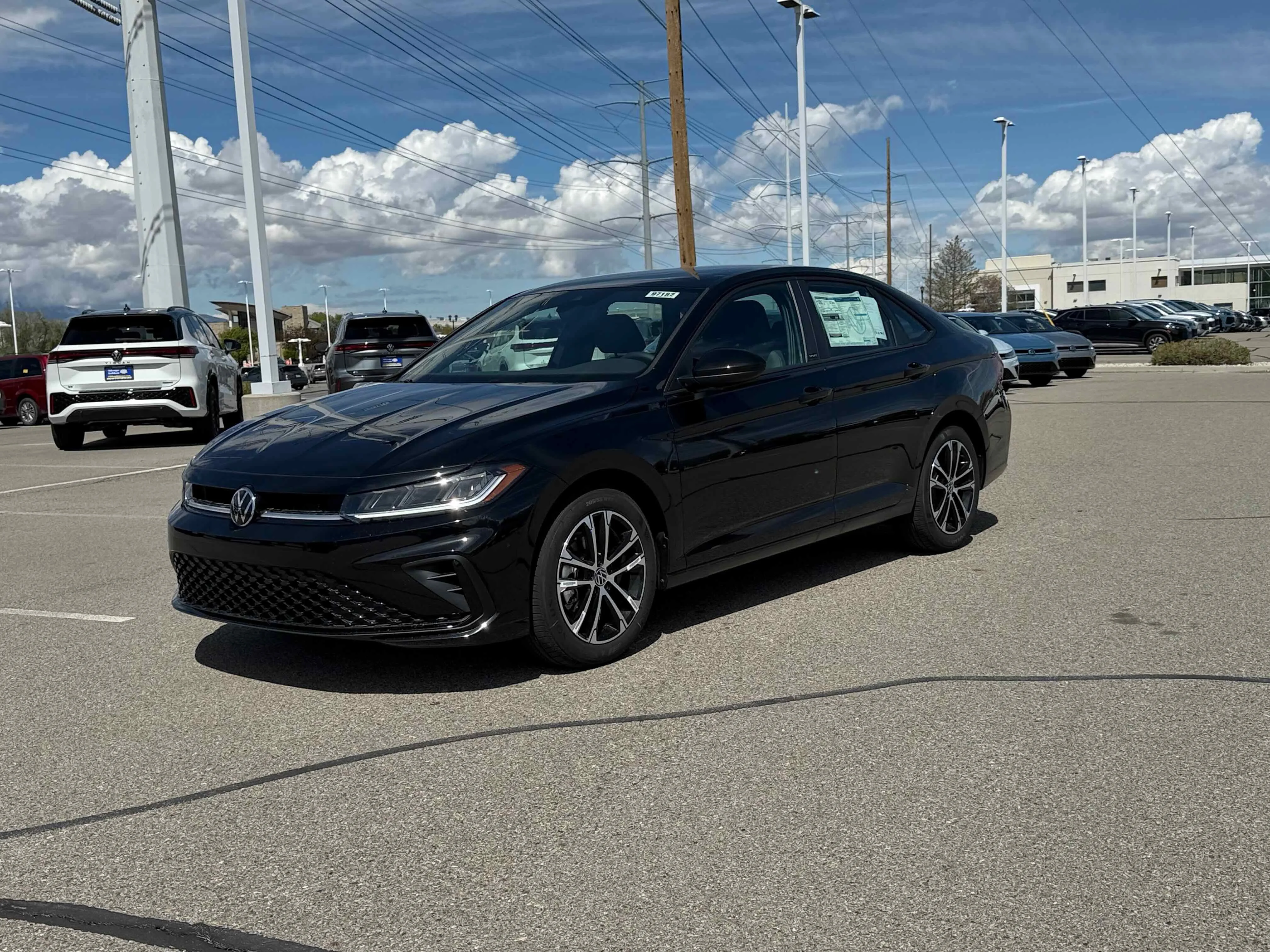 New 2026 Deep Black Volkswagen Sport image 1