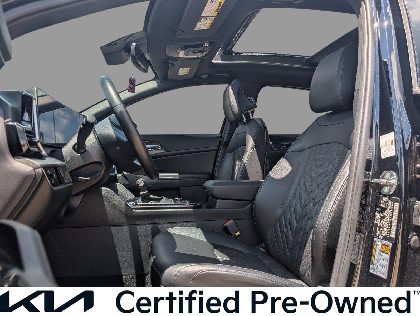 Used 2024 Ebony Black Kia X-Pro image 14