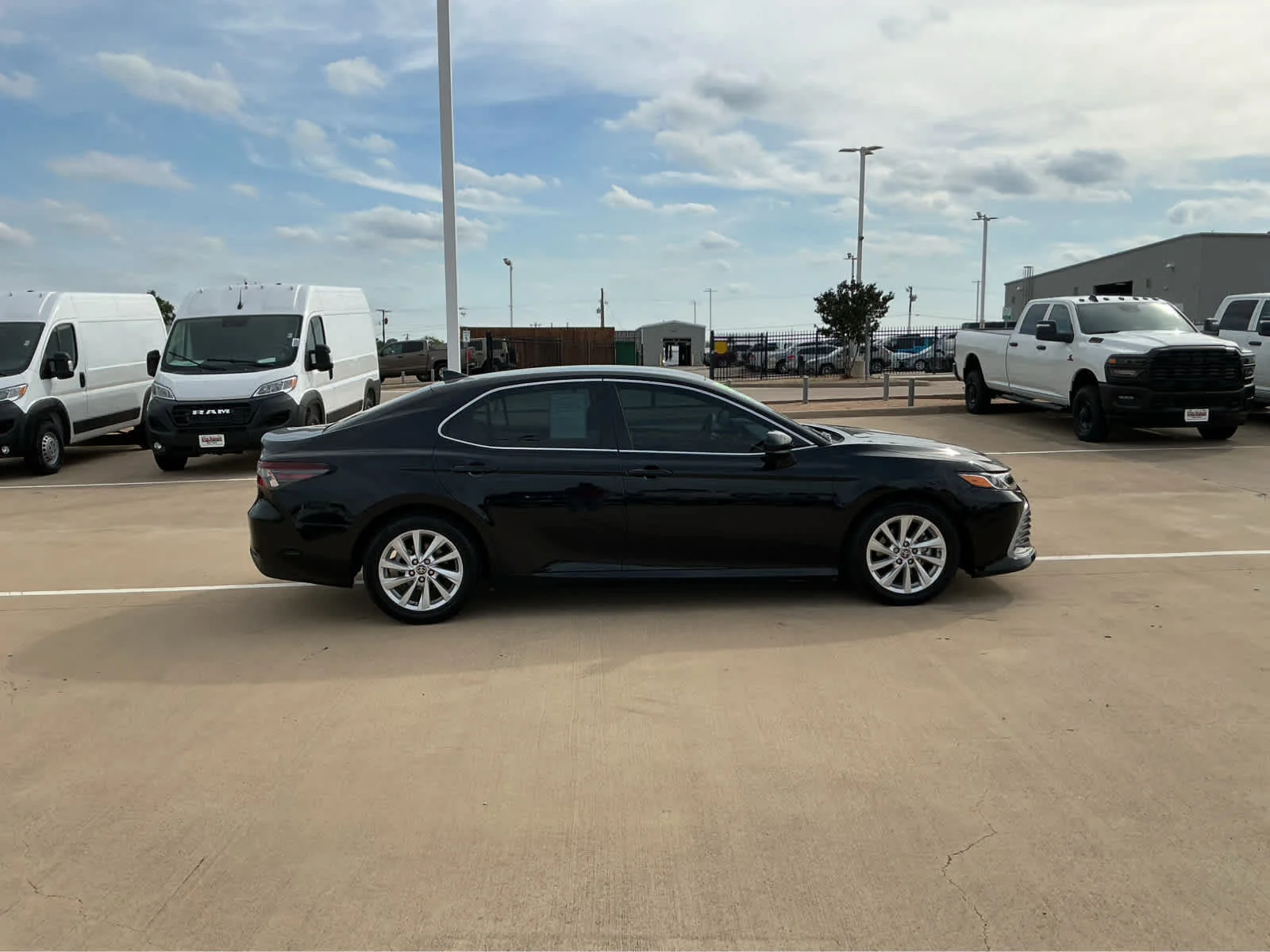 Used 2023 Midnight Black Metallic Toyota LE image 5