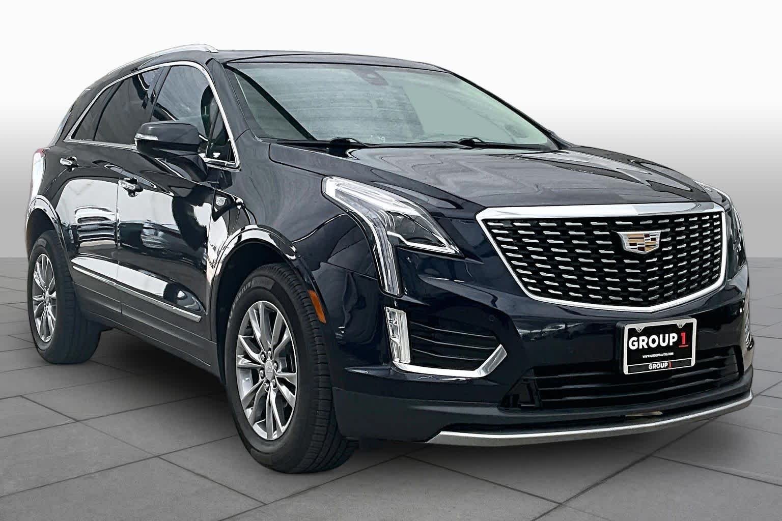 Used 2021 Dark Moon Blue Metallic Cadillac FWD Premium Luxury image 3