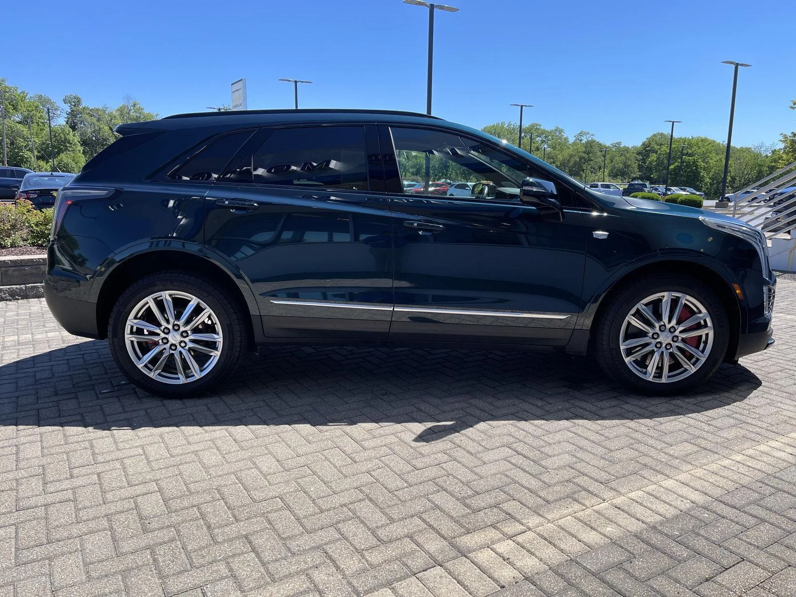 Used 2024 Emerald Lake Metallic Cadillac Sport image 6