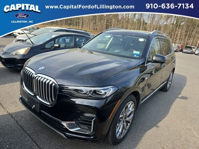 Used 2021 Black BMW xDrive40i image 1