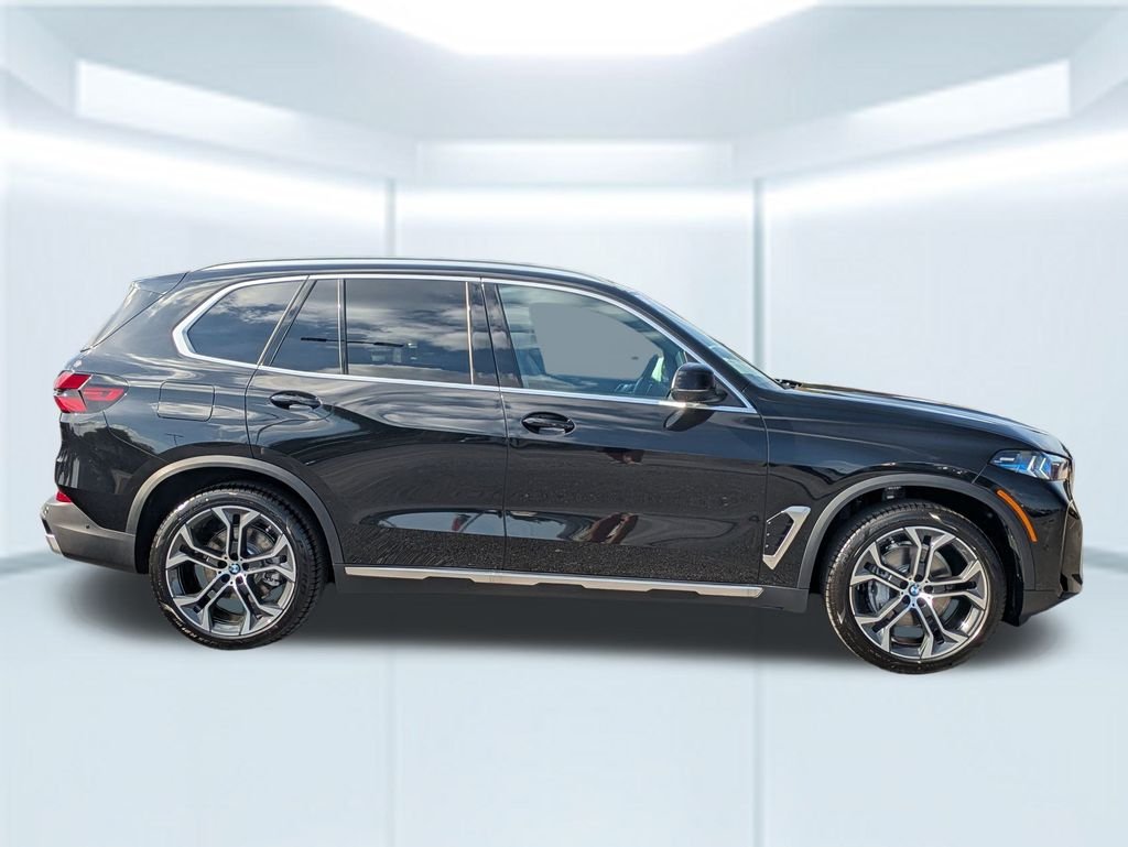 New 2026 Black Sapphire Metallic BMW sDrive40i image 6