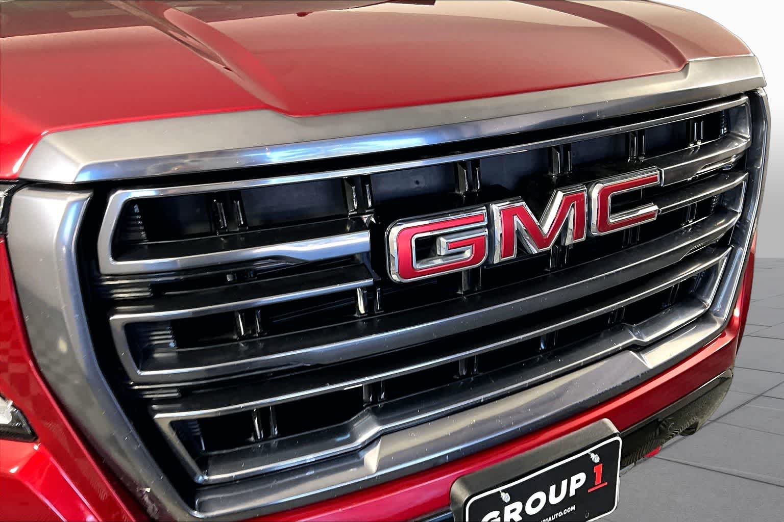 Used 2023 Volcanic Red Tintcoat GMC AT4 image 29