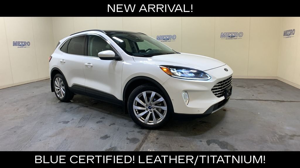 Certified Used 2022 White Metallic Ford Titanium image 1