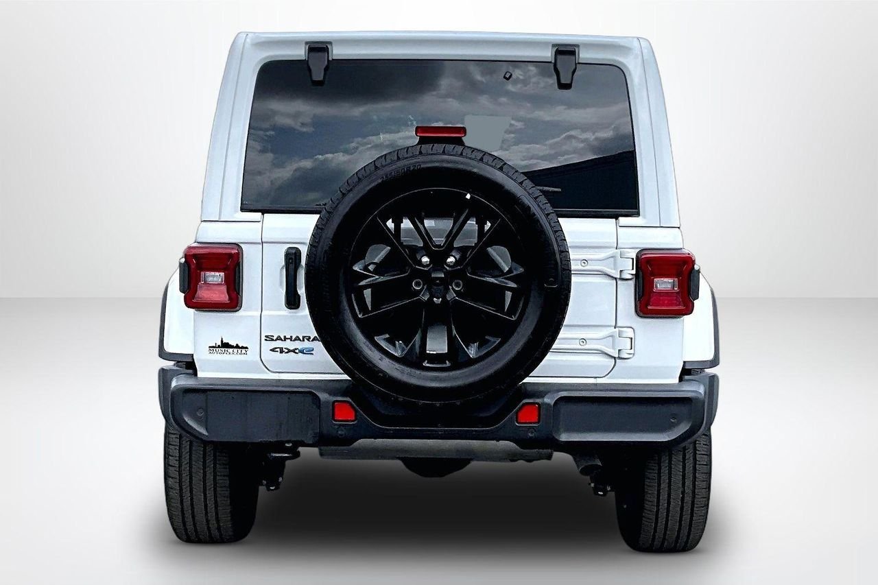 Used 2025 Bright White Clearcoat Jeep Sahara 4xe image 7
