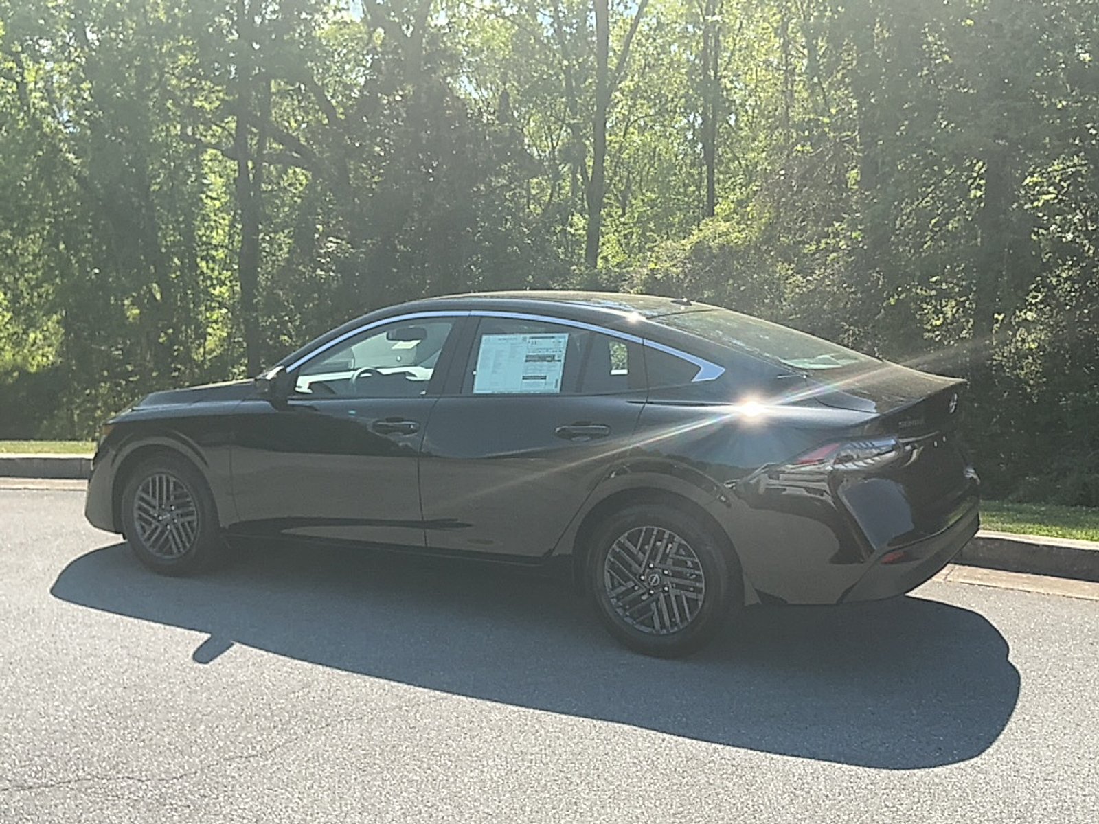New 2026 Super Black Nissan SV image 3