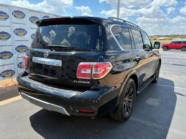 Used 2019 Super Black Nissan Platinum image 4