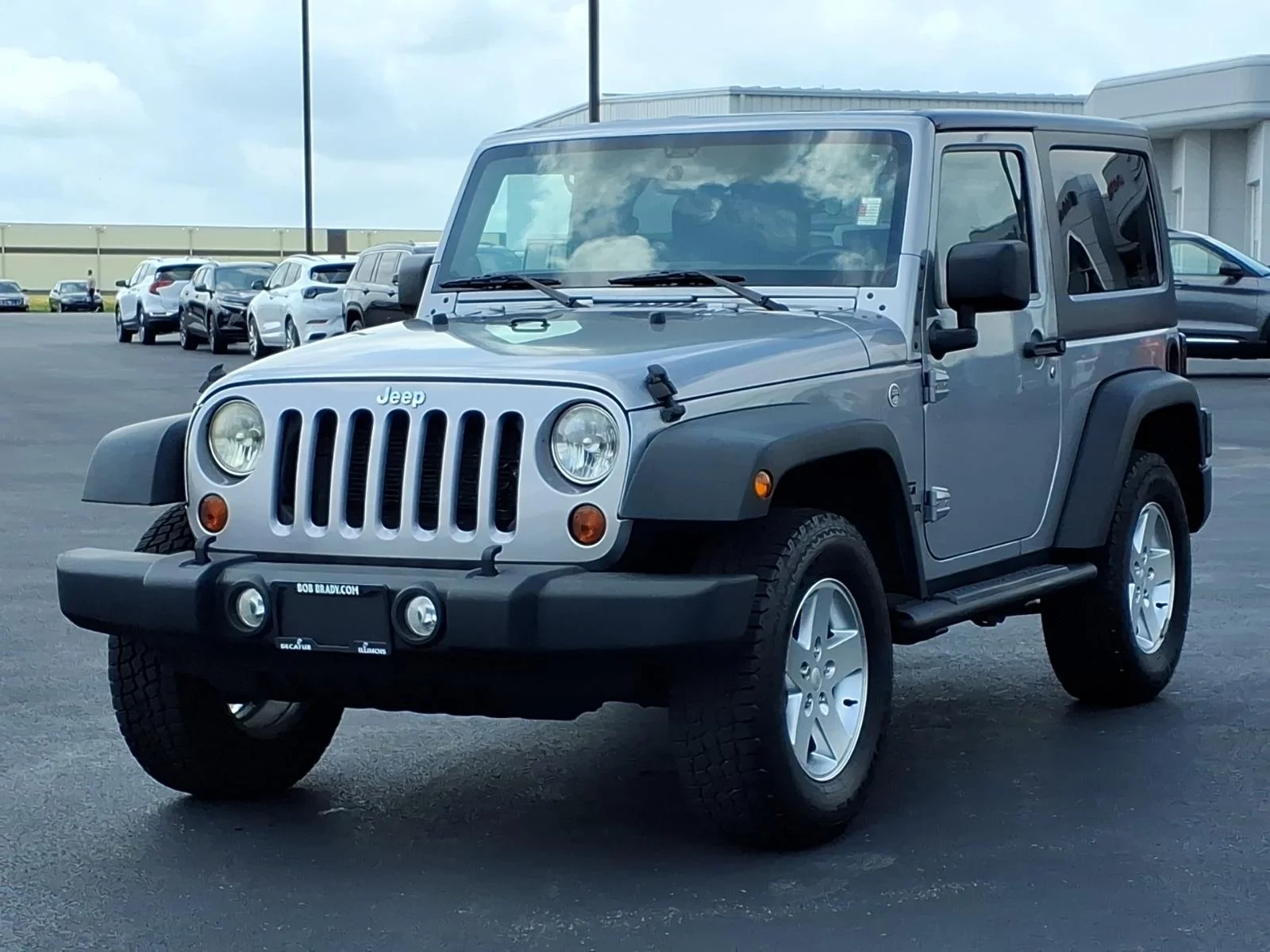 Used 2013 Billet Silver Metallic Clear Coat Jeep Sport image 12